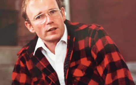 Photo of Tom Eastler ’66 in a red/black plaid coat